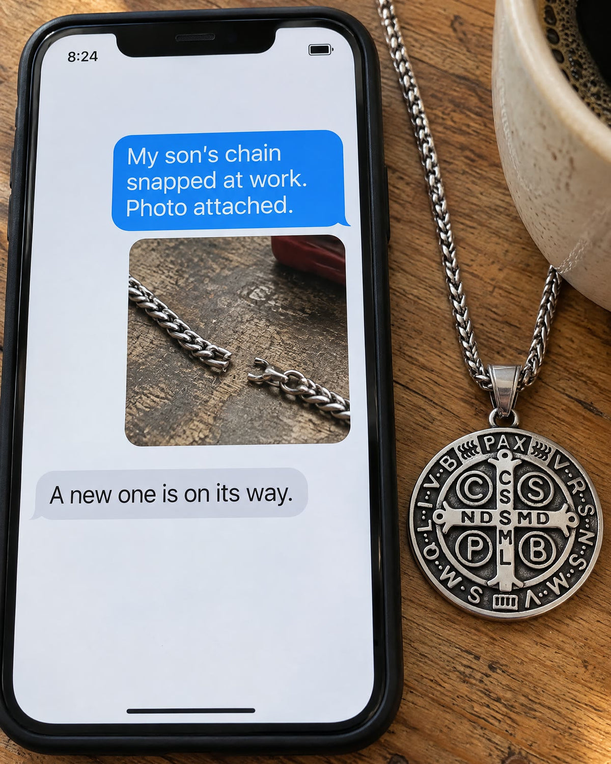 A phone with the message My son’s chain snapped at work and the reply A new one is on its way, the medal beside it