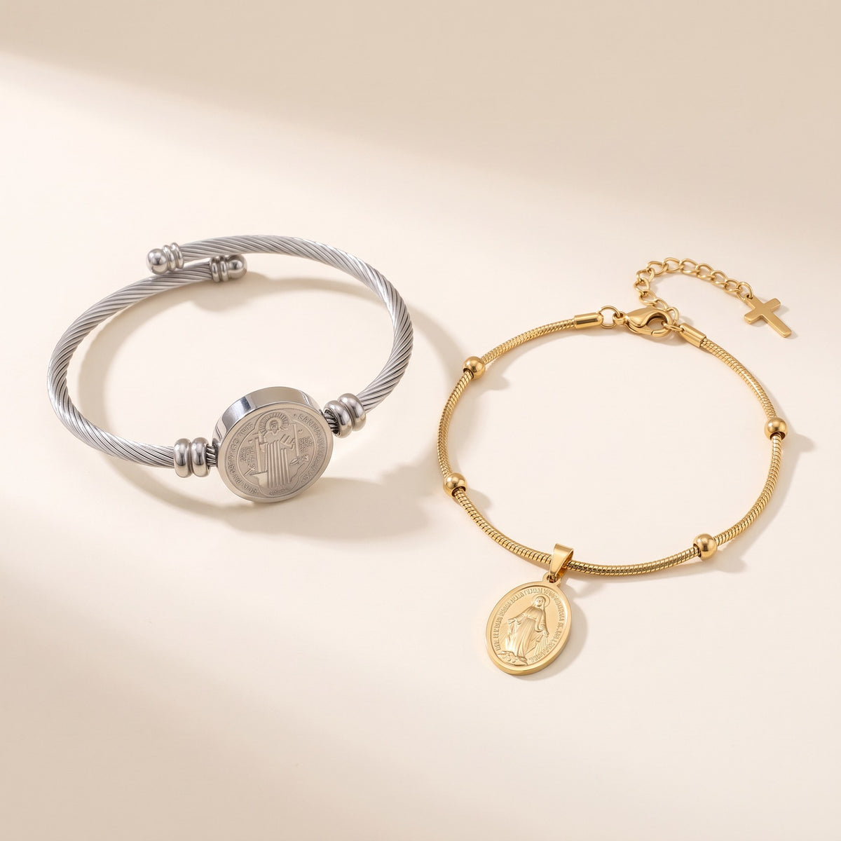 His St Benedict bracelet and her Miraculous Medal bracelet