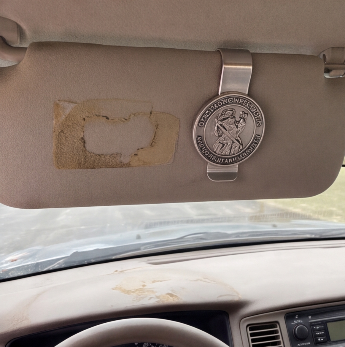 A customer’s photo of the St Christopher visor clip