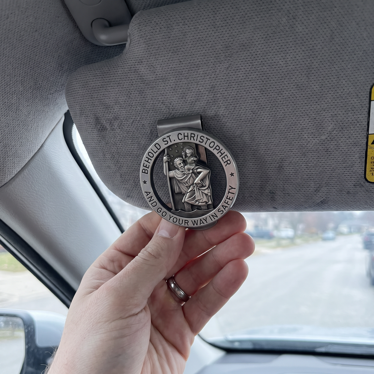 A customer’s photo of the St Christopher visor clip