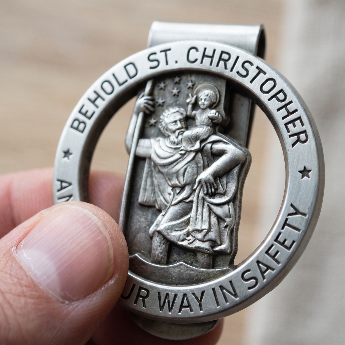 The St Christopher visor clip up close